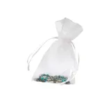 Stimmungsbild zu Perlenarmband "Kreuz" - türkis